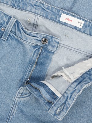 Five-pocket stone-bleached jeans