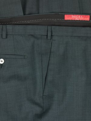 Close-up of dark teal men's trousers; waistband shows a Digel label. The trousers have a single button and a front crease. Fabric appears to be a fine weave.