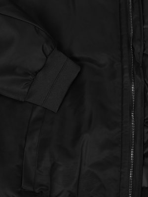 Bomber jacket with label patch on the sleeve