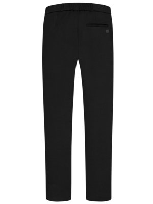 Black pants with an elastic waistband and a small pocket on the back. The pants are shown from the rear view. A small, dark label is visible on the right back pocket.