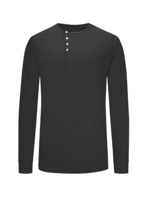 Long-sleeved top in jersey fabric with offset button placket 