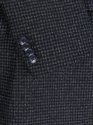 Sako s pepitovým vzorem a záplatami na loktech