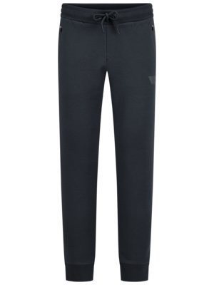 Jogging bottoms with rubberised logo details 