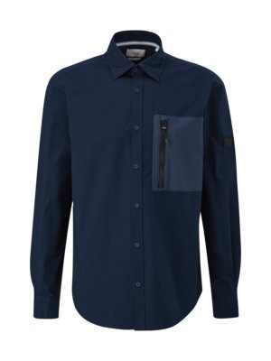 Shirt with zipped breast pocket 