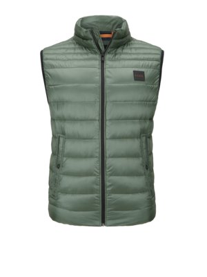 Quilted gilet with rubberised logo patch