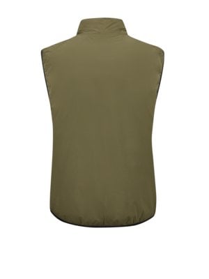 Reversible functional gilet with padded quilting on one side