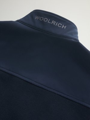 Hybrid softshell jacket with knit inserts