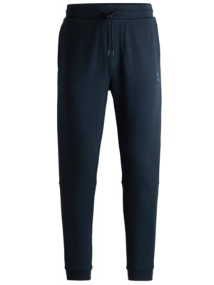 Effen kleur joggpants met rubberen logo-embleem 