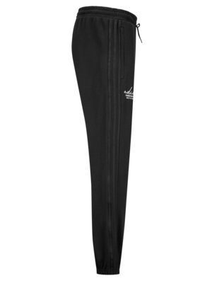 Jogging bottoms with tonal stripes and rubberised logo