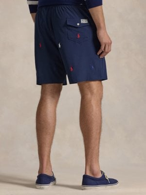 Swimming trunks with all-over embroidered logo and stretch fabric