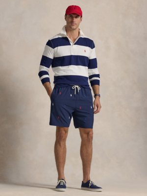 Swimming trunks with all-over embroidered logo and stretch fabric