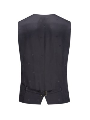 Back view of a dark blue vest. The vest is closed and features small repeating patterns across the fabric. An adjustable strap with a buckle is visible at the bottom. The vest appears to be tailored.
