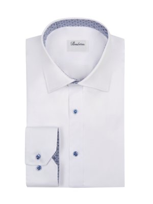 Plain shirt with patterned collar lining