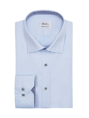 Plain shirt with patterned collar lining