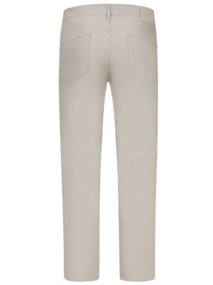 Back view of light beige pants on a white background. The pants have five pockets and belt loops. The back pockets have stitching details. A small label is visible at the back of the waistband.