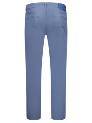 Back view of light blue pants. The pants have pockets on the back, and a blue leather patch at the waistband. The legs are straight and the image is set against a white background.