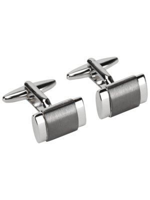 Cufflinks with raised insert