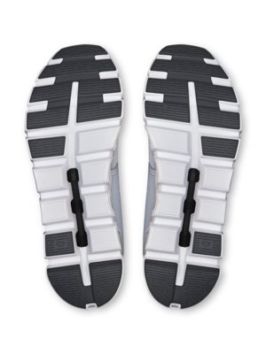 Rückseitenansicht von zwei Laufschuhen mit weißer Zwischensohle und weißer Sohle mit schwarzem und grauem Profil.