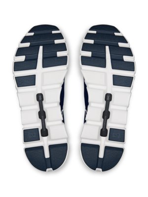 Unterseite zweier Laufschuhe mit weißer Sohle, dunkelblauen Einsätzen und schwarzem Speedboard-Element.