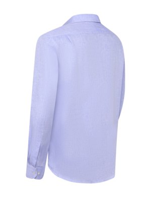 Rear view of a light blue long-sleeved shirt on a white background. The shirt has a collar, buttons on the cuffs, and a curved hem. The fabric appears to be textured.