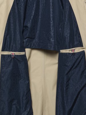 Weatherproof short coat for transitional periods