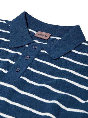 Striped bouclé cotton-blend knit polo shirt