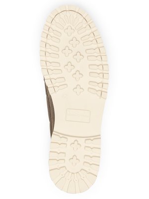 A close-up image shows the bottom sole of a brown shoe. The sole is off-white and features a textured pattern with a series of lines and cross shapes. The shoe size "42" is visible. The brand name "Marc O'Polo" is on the sole.
