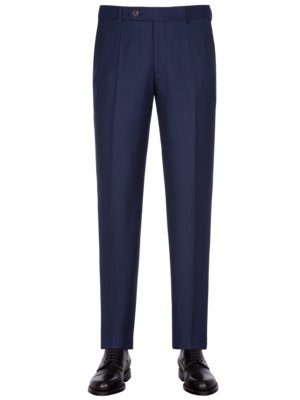 A pair of navy blue dress pants with pleats is displayed on a white background. The pants have a button closure and pockets. Black dress shoes are shown at the bottom. The pants are tailored and straight-legged.