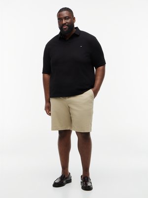 Piqué-Poloshirt 1985 mit Logo-Stickerei und Stretch, Regular Fit