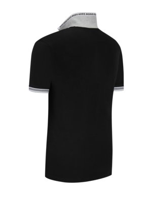 A black polo shirt, viewed from the back and slightly from the side, with a gray collar that has "BOSS" printed around the edge in white. The sleeves have a gray and white trim.