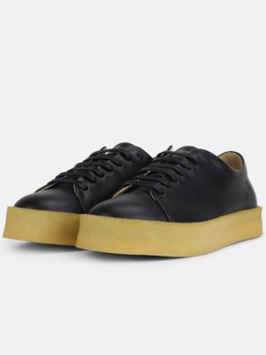 Leather sneaker with striking rubber sole