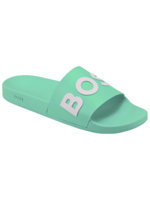 Trendy slides with 3D label in a contrasting colour