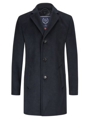 Coat with removable yoke