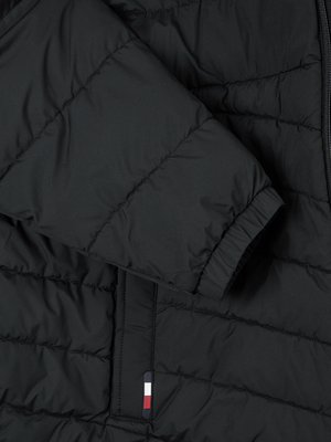 Quilted jacket with logo patch