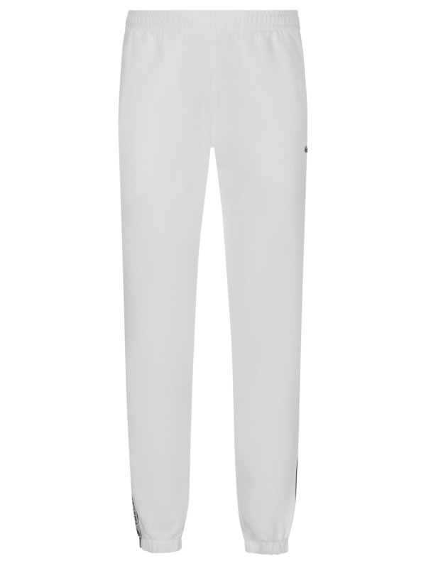 Joggpants mit Seitenstreifen und elastischem Beinabschluss von Lacoste in Weiß