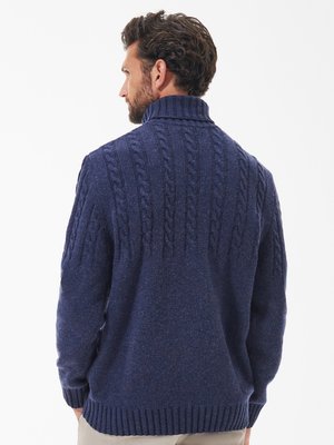 Rollkragenpullover aus einem Wollgemisch mit Zopfmuster