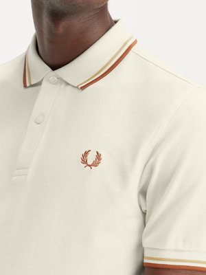 Poloshirt mit Logo-Stickerei und Kontrastbündchen