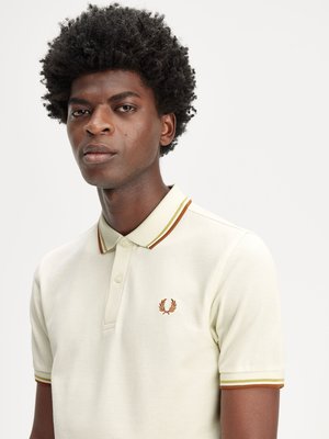 Poloshirt mit Logo-Stickerei und Kontrastbündchen