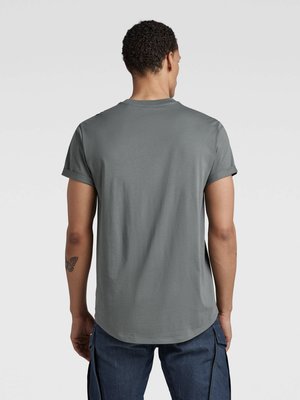 Leichtes T-Shirt mit abgerundetem Saum und Label-Print