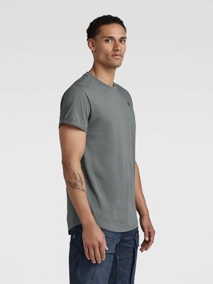 Leichtes T-Shirt mit abgerundetem Saum und Label-Print