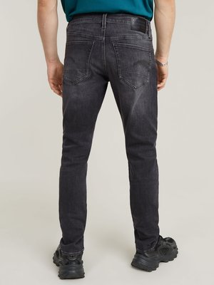 Stretch-Jeans in Washed-Optik, Slim