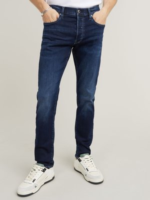 Raw Stretch-Jeans in Wasehd-Optik, Slim