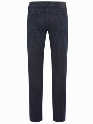 Dunkle Jeans von hinten fotografiert. Die Jeans hat einen geraden Schnitt und zwei Gesäßtaschen. Der Stoff wirkt leicht ausgewaschen. Am Bund ist ein Lederpatch sichtbar.