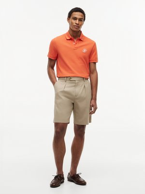Poloshirt aus einem Baumwoll-Mesh mit Monogramm-Stickerei, Regular Fit