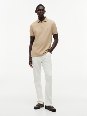 Unifarbenes Poloshirt 1985 und kleiner Flag-Stickerei, Regular Fit