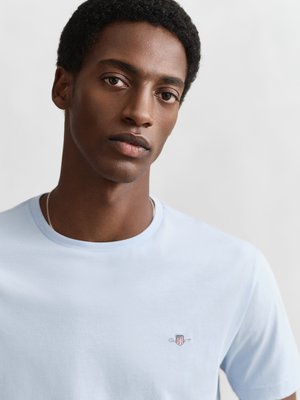 Unifarbenes T-Shirt mit Logo-Stickerei, Regular Fit