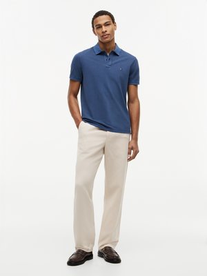 Poloshirt aus gewaschenem Baumwoll-Piqué, Regular Fit