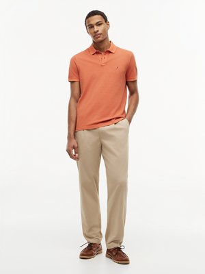 Poloshirt aus gewaschenem Baumwoll-Piqué, Regular Fit