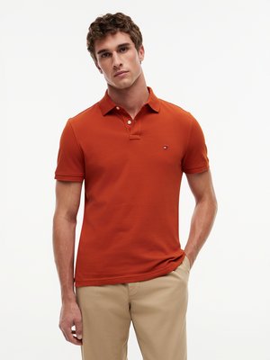 Unifarbenes Poloshirt 1985 und kleiner Flag-Stickerei, Regular Fit