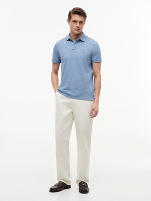 Unifarbenes Poloshirt 1985 und kleiner Flag-Stickerei, Regular Fit